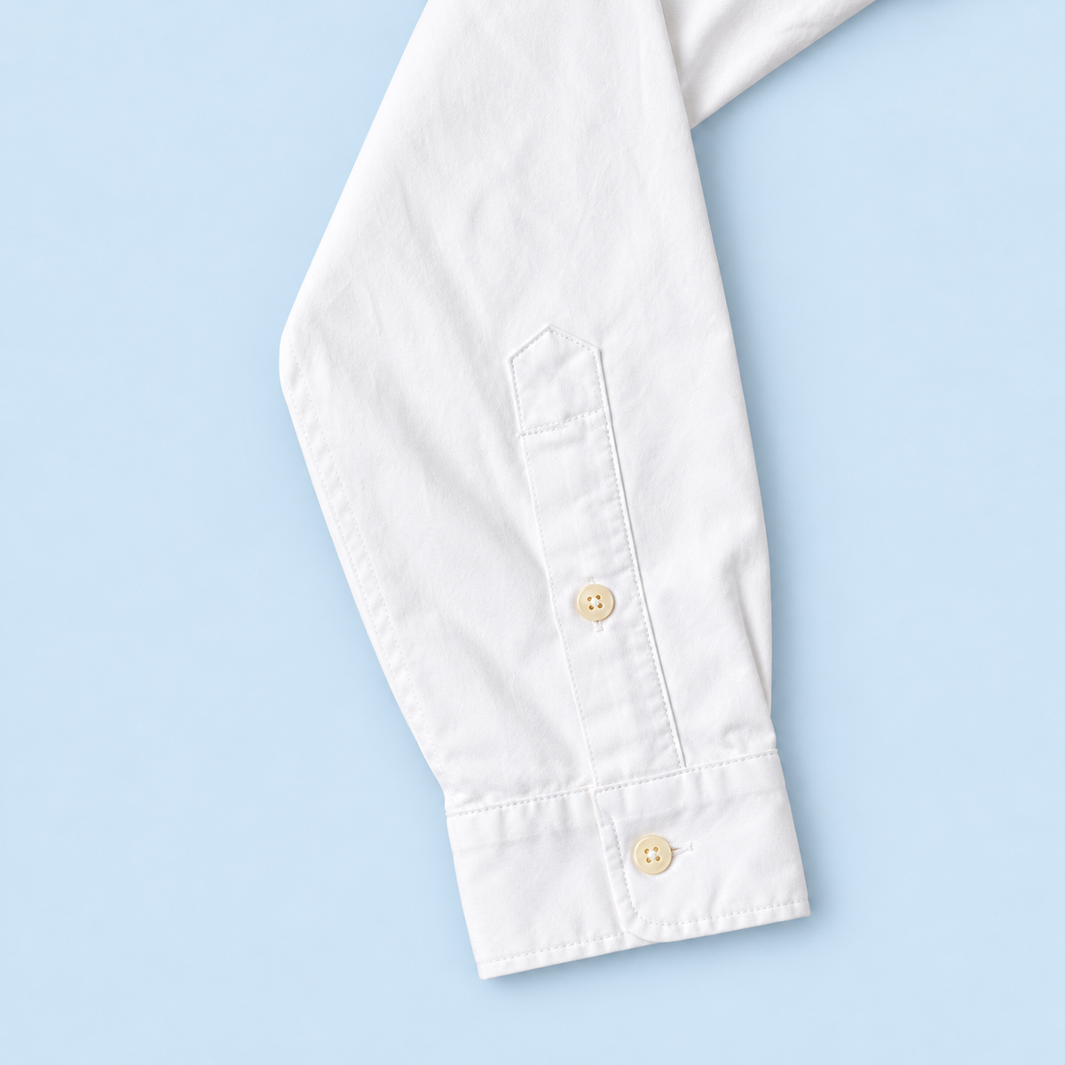 White Ralph Lauren upcycled jacket — sleeve, cuff and cream button detail