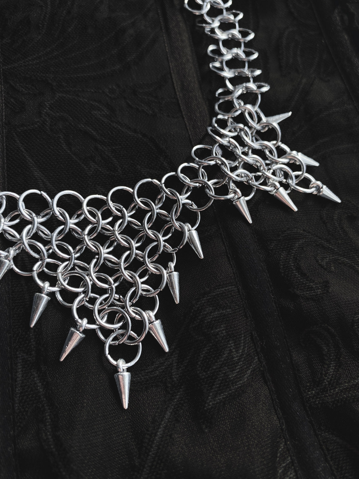 Detail photograph of the Urtica steel chainmail necklace by Mandragor Design